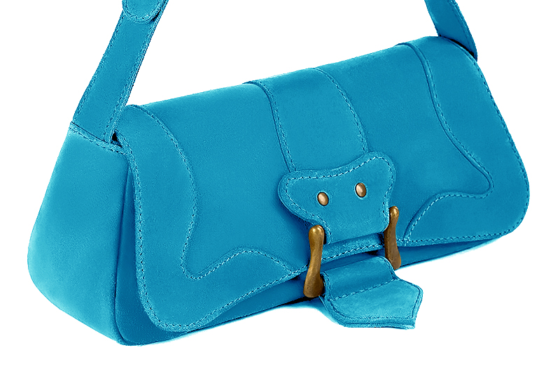 Handcrafted women's small luxurious elegant handbag in premium turquoise blue leather. Perfect for elevated everyday style.   
                Choose from our luxurious collections of leather and fabric to perfectly match your handbags to your outfits.